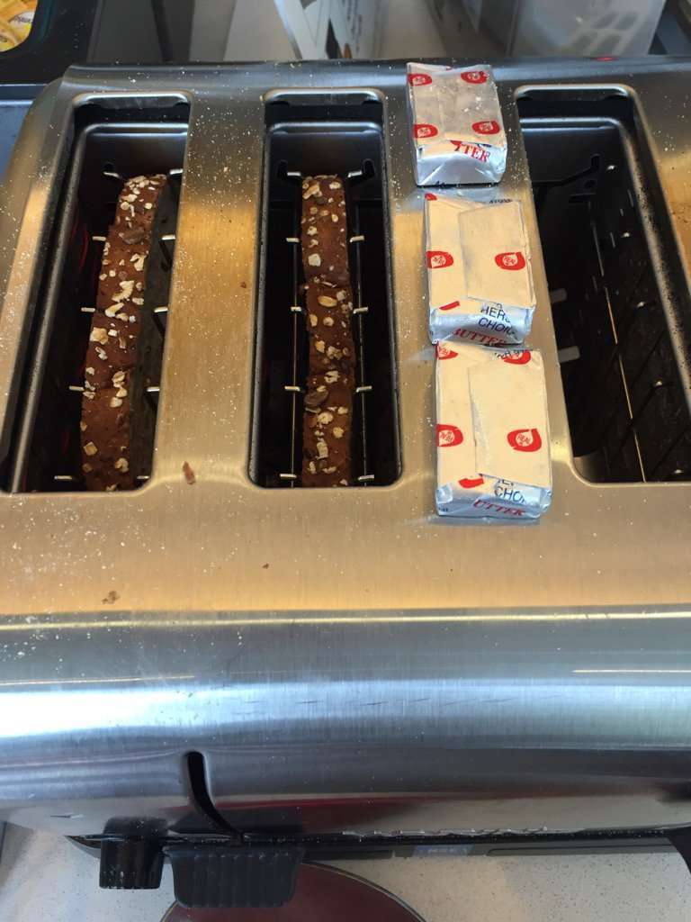 Warm up the little butter packets at hotel breakfast by setting them on the toaster while your bread cooks.