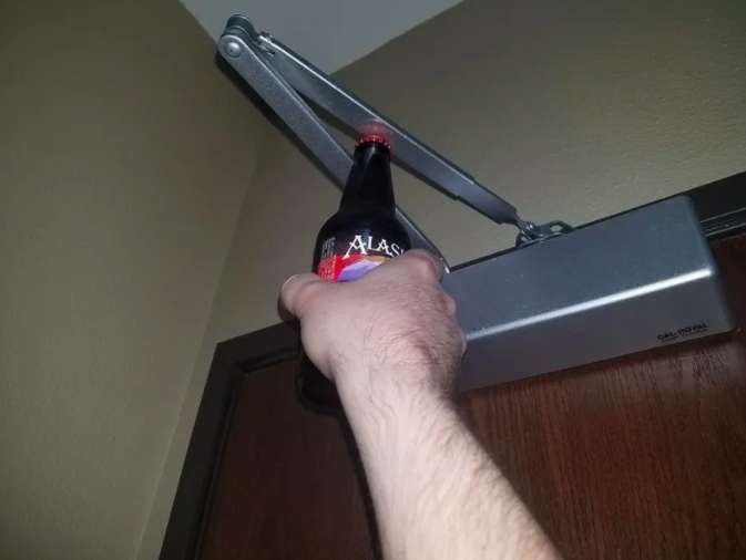 Don’t have a bottle opener? Most hotel doors will take care of that for you.