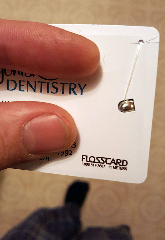 This Dentist Office's Business Card Has 11 Meters Of Floss Built In