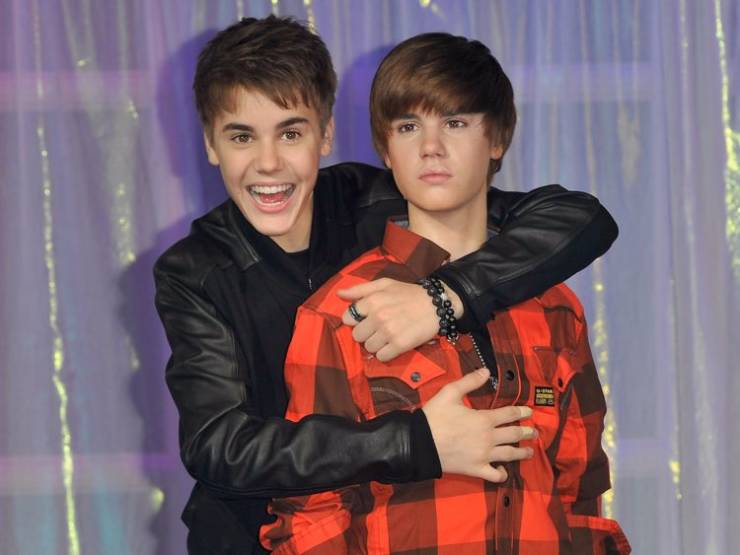 Justin Beiber hugged his wax figure at Madame Tussauds London.