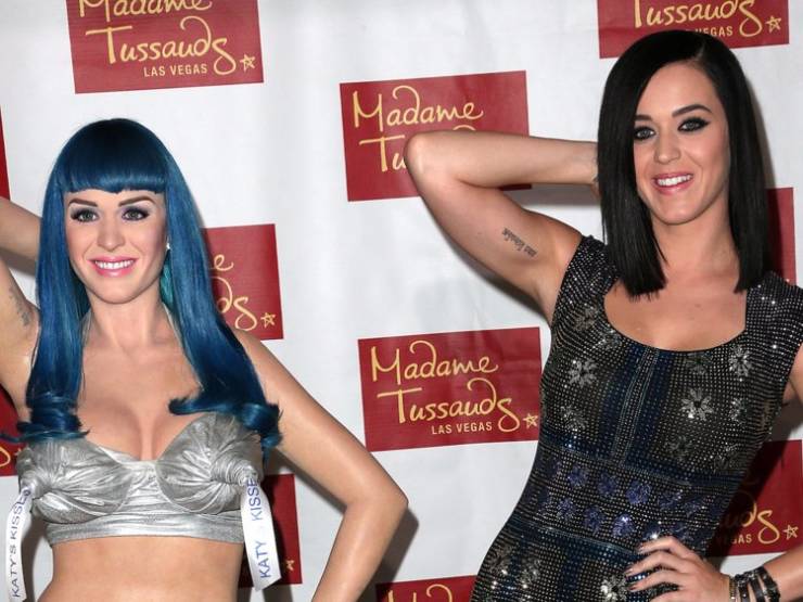 When Katy Perry unveiled her wax figure, she posed like it.