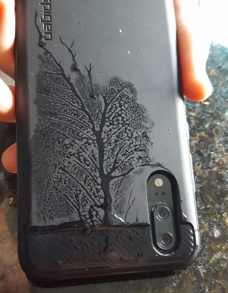 Water decided to make its mark on the back of this phone.