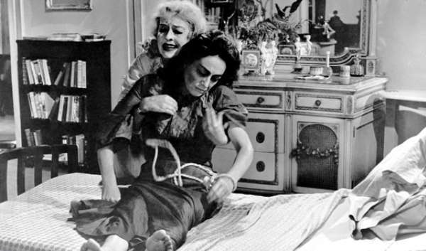 ‘What Ever Happened to Baby Jane?’ feud.
During a scene, actress Bette Davis kicked Joan Crawford so hard that she ended up needing stitches. To retaliate Crawford put weights in her pocket to make it harder for Davis to drag her lifeless body during the above scene, which strained her back.