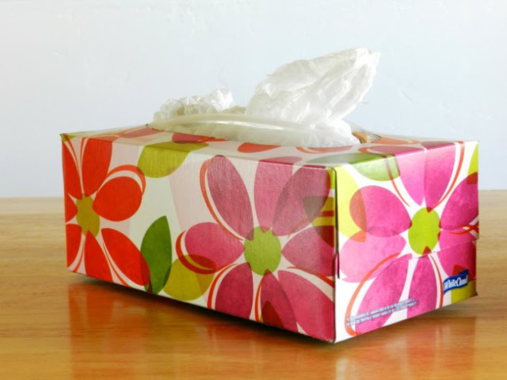 Store plastic bags in a tissue box. Raise your hand if you’re a plastic bag collector. Now there’s a clever organizing trick to store all those bags from various places which are perfect for recycling. Loop the bags through each other’s handles and stuff them into an old tissue box.