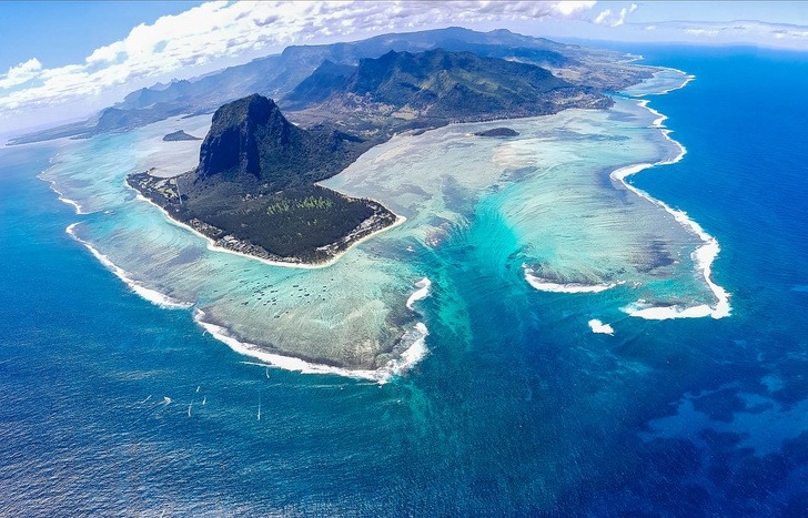 This aerial view of South-West Mauritius unveils what looks like an underwater waterfall.