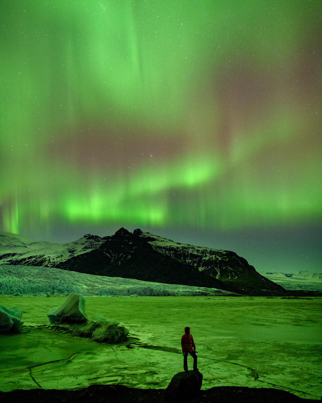 “This was taken a few nights ago in southeast Iceland facing a massive glacier lit by the northern lights.”