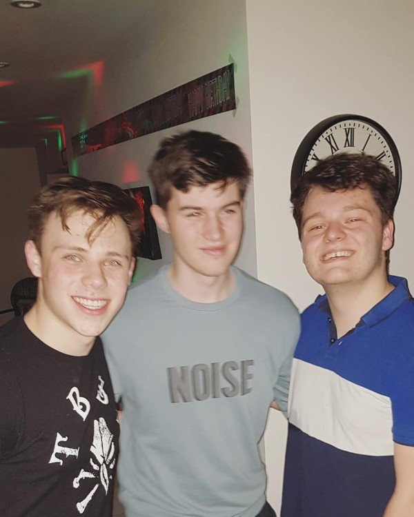 The guy on the right was suffering from depression, so his friends threw him a surprise party for his 18th birthday.