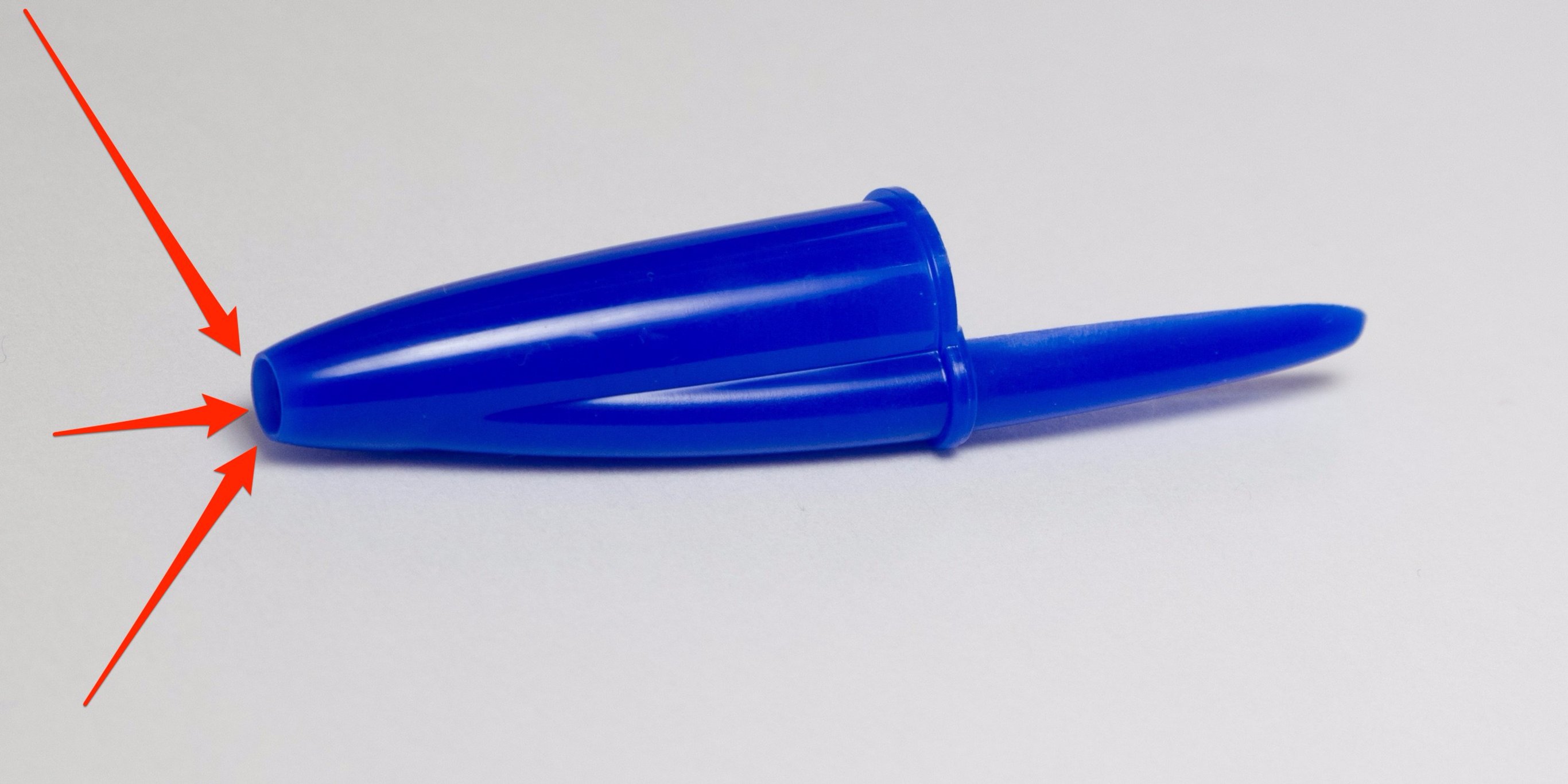 Pens have holes in their caps to prevent choking.