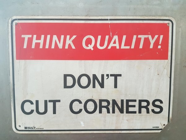 street sign - Think Quality! Don'T Cut Corners Brady