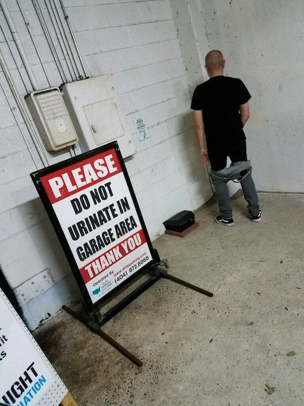 signage - Please Do Not Urinate In Garage Area Thank You Operated By 404 872.8868 S Jation