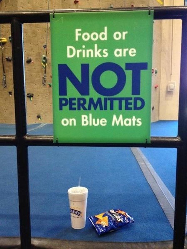 funny people ignoring warning signs - Food or Drinks are Anot Permitted on Blue Mats