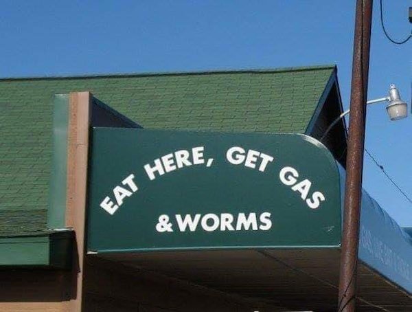 street sign - Here, Get Gas & Worms