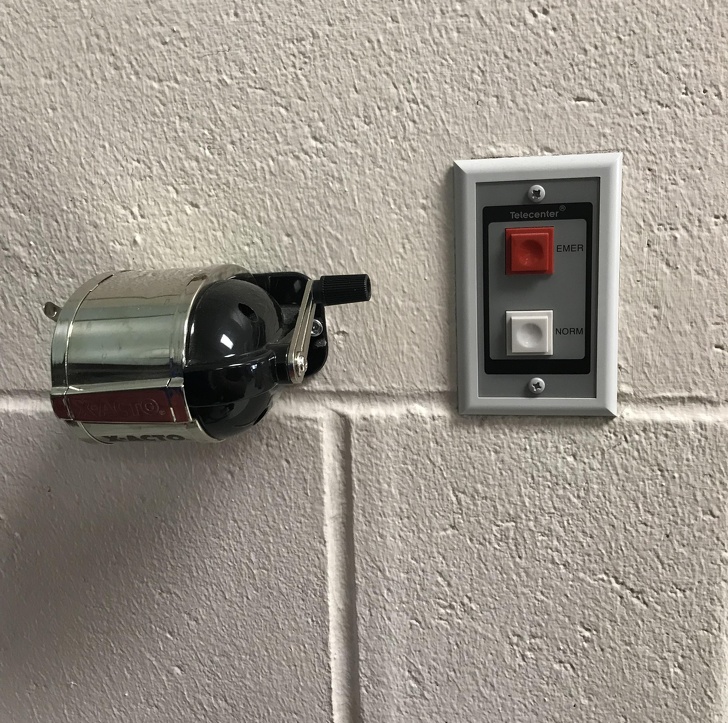 An emergency button that totally won't get pressed being next to this pencil sharpener.