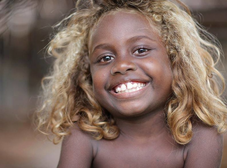 black girl with natural blonde hair
