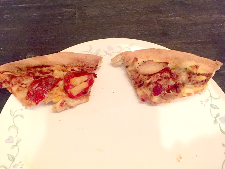 This is how this husband cuts two slices of pizza in half.