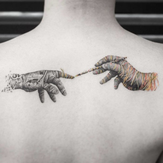 hand tattoo on back