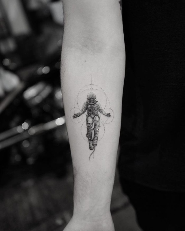 little astronaut tattoo