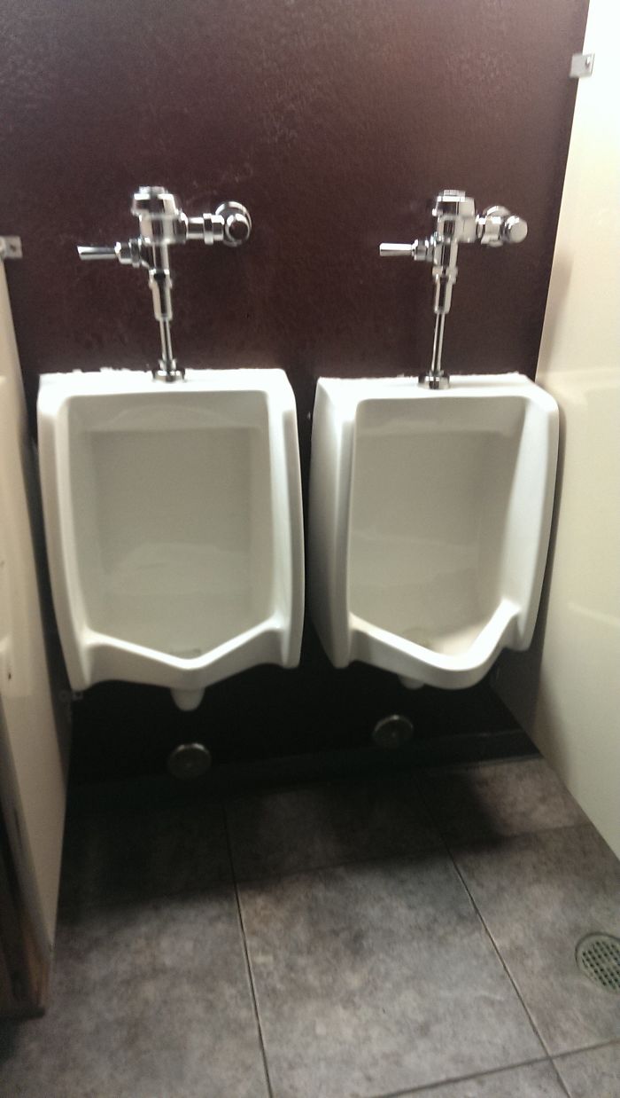guys peeing in urinals