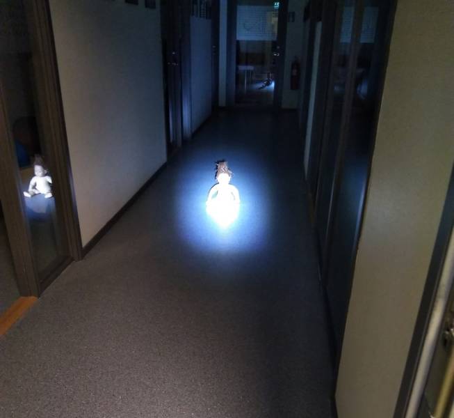 creepy doll left in hallway