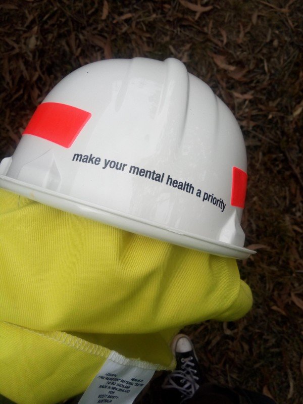 Message on the back of a hard hat.