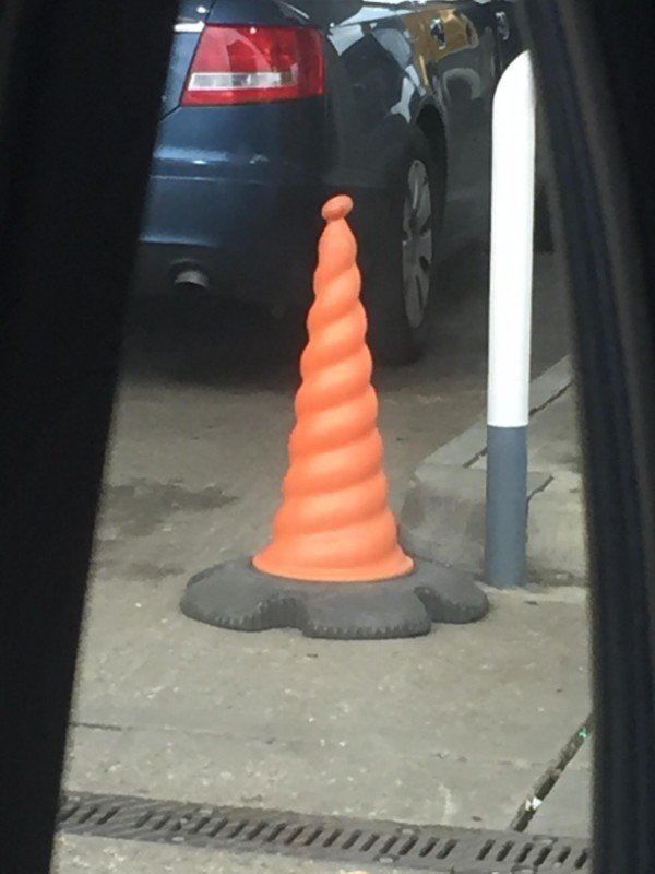 Twirly cone at a gas station.