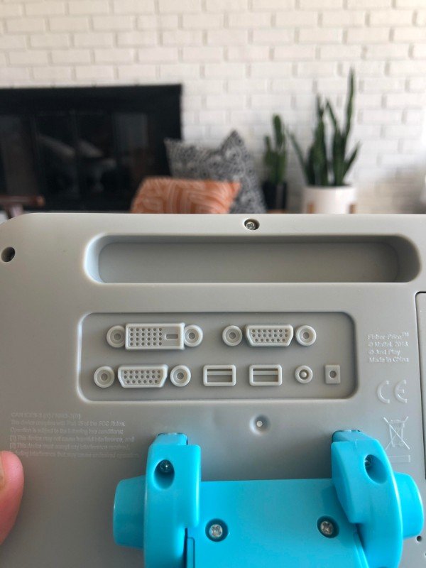 Kid’s fake cash register has fake inputs on the back.