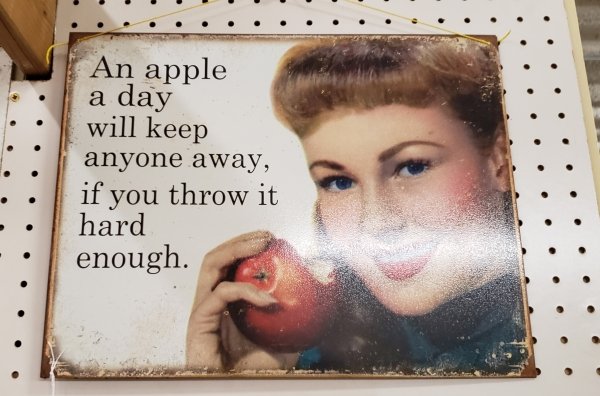 thrift store lip - An apple a day will keep anyone away, if you throw it hard enough.