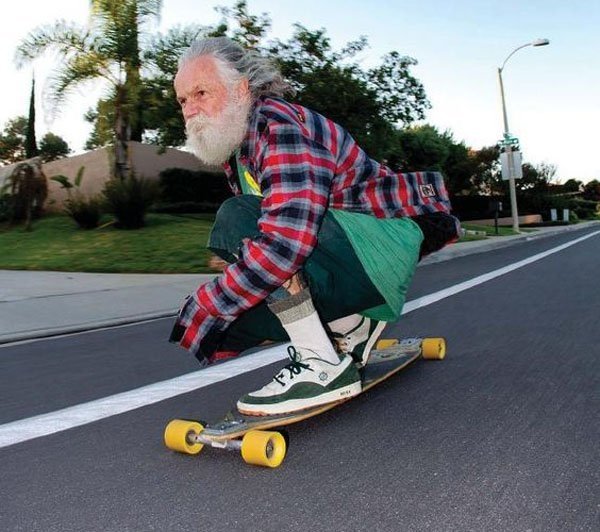 old man longboarding
