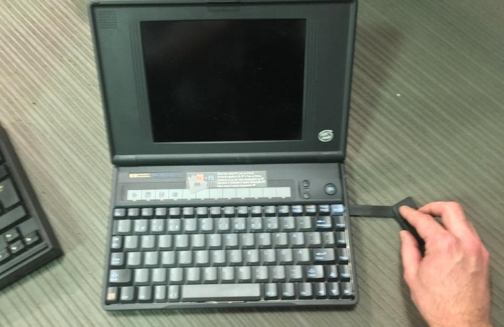 Old laptop with a weird mouse.