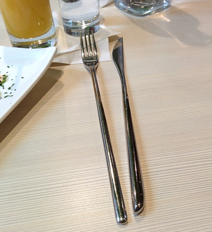 Very long fork and knife.