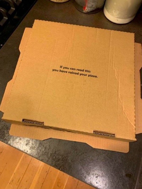 fail cardboard - If you can read this you have ruined your pizza.