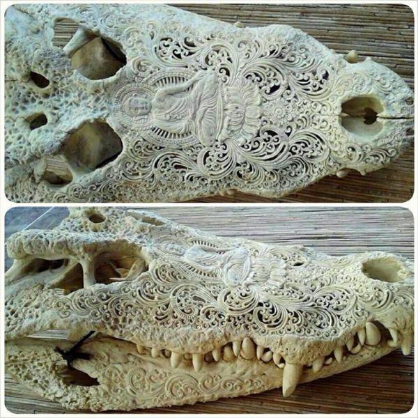 carved crocodile skull