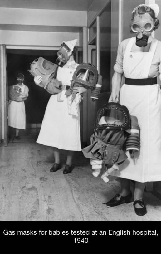gas masks baby ww2 - Gas masks for babies tested at an English hospital, 1940