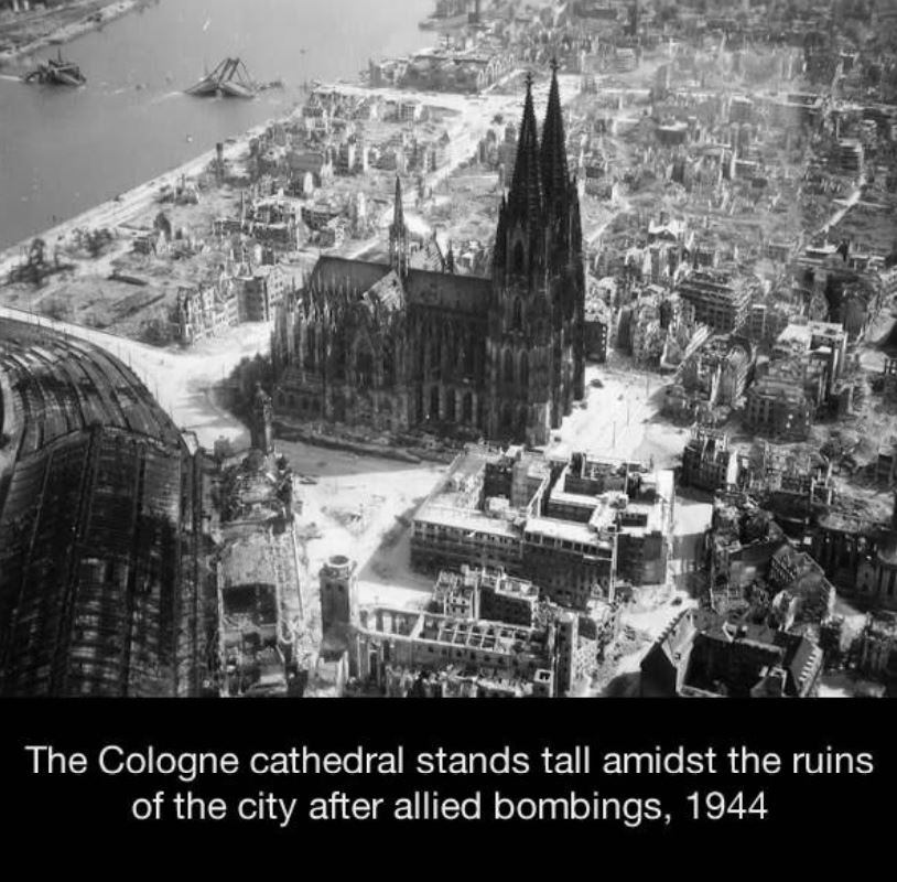 cologne cathedral ww2 - The Cologne cathedral stands tall amidst the ruins of the city after allied bombings, 1944