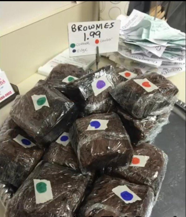 Brownies labeled where they were cooked in the pan.