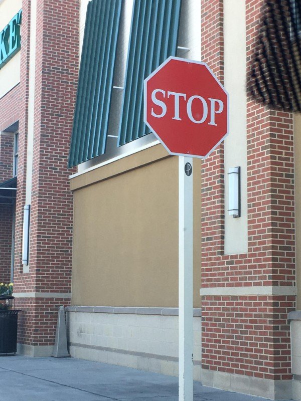 A stop sign with serifs.