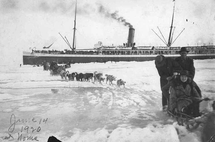 Passengers being taken over ice, 1920.