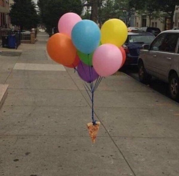 pizza tied to balloons
