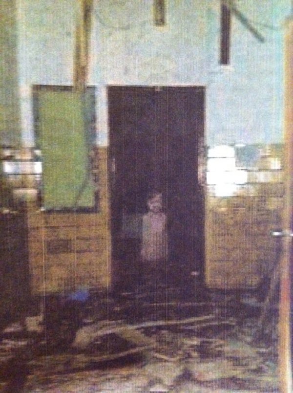A girl appears in this pic of an abandoned school.