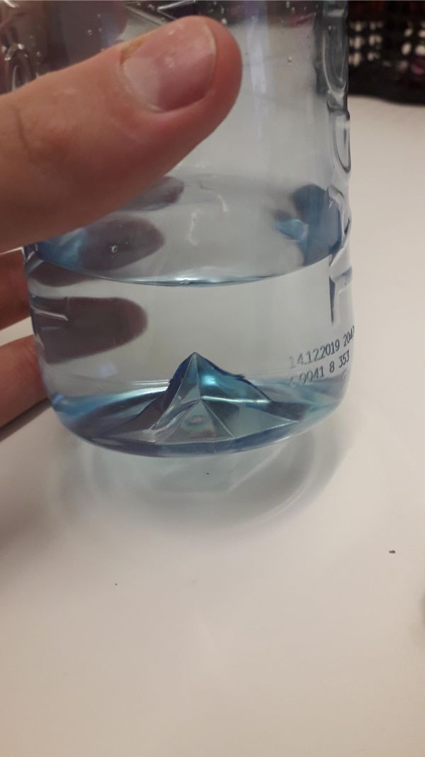 This water bottle has a mountain in it.