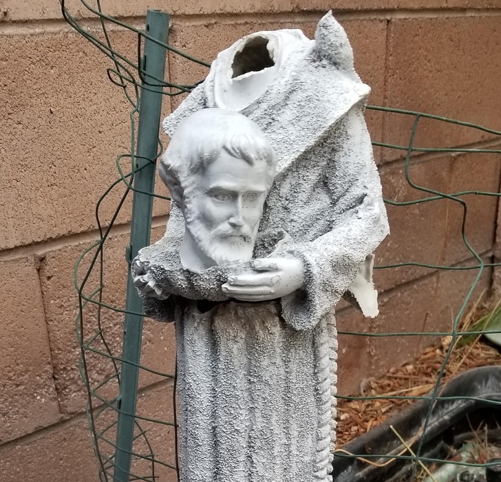 The wind knocked this statue over and this is how they fixed it.