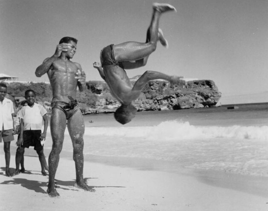 Practicing acrobatics in Barbados, 1955.