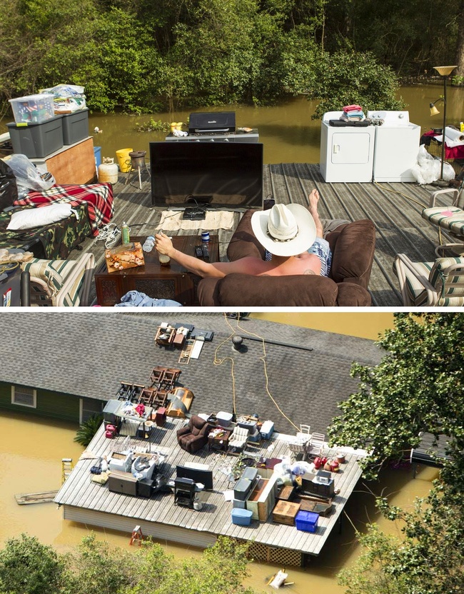 This flood didn't stop him from chilling on his roof.