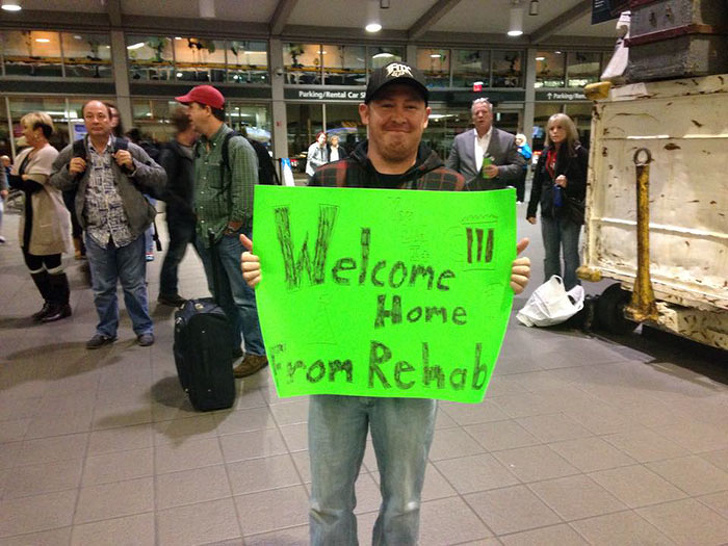 Sibling trolling - funny airport greeting signs - ParkingRentals Welcome Home rom Rehab