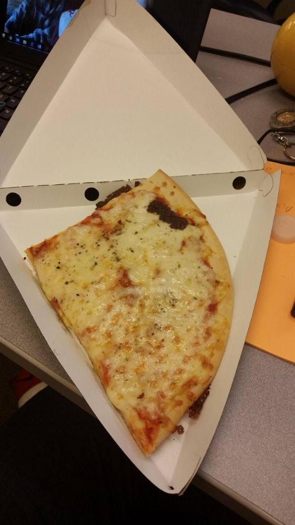irritating images - Pizza in a box cut in a weird shape