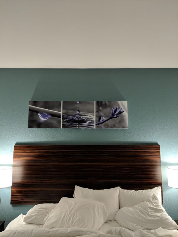 irritating images - off-center head board above a bed