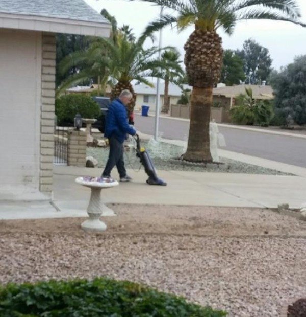 vacuuming the driveway