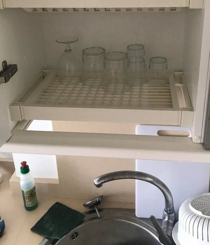 Cupboard Drips into a sink.