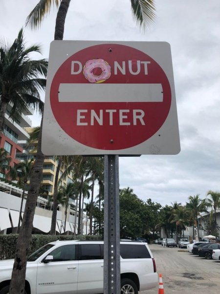 street sign - Donut Enter