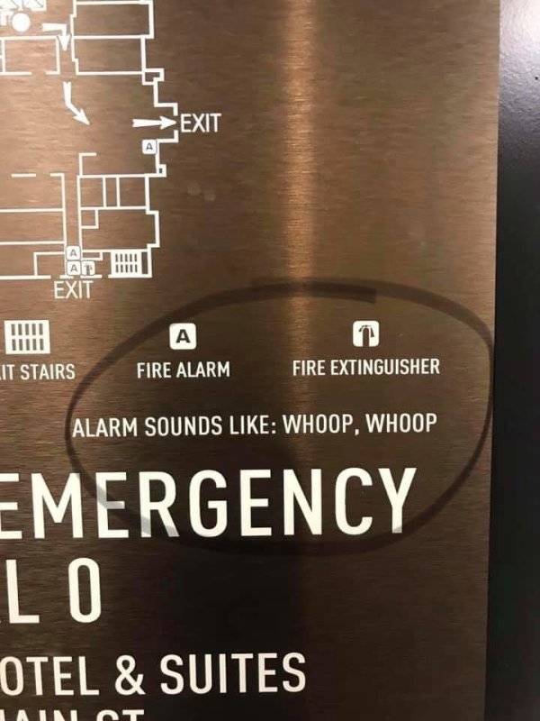 sign - >Exit Hilli Iiiii Exit Liit! Lit Stairs Fire Alarm Fire Extinguisher Alarm Sounds Whoop, Whoop Emergency Lo Otel & Suites Lainot